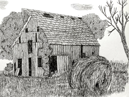 A pen and ink artwork depicting an old barn with a large haybale in the foreground and trees in the background.