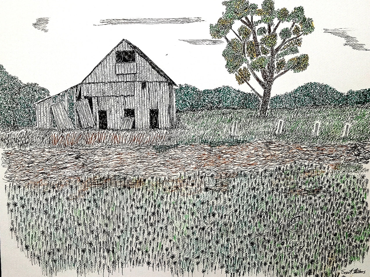 An old barn in a grassy field with trees in the background