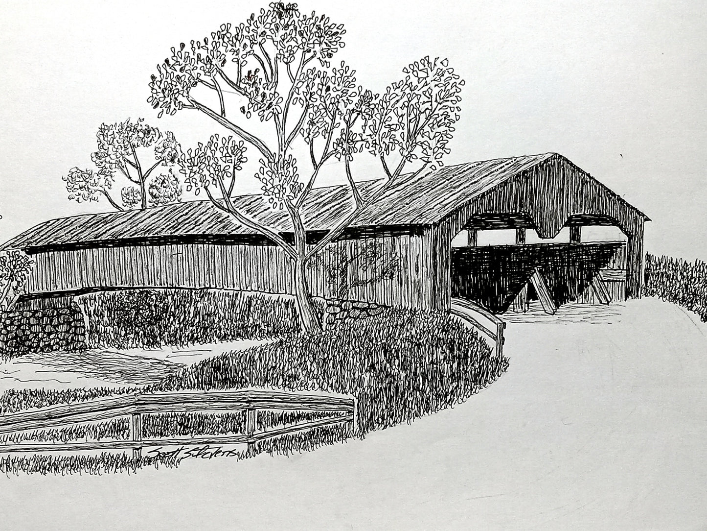 Black and white illustration of a covered bridge with trees and a path.