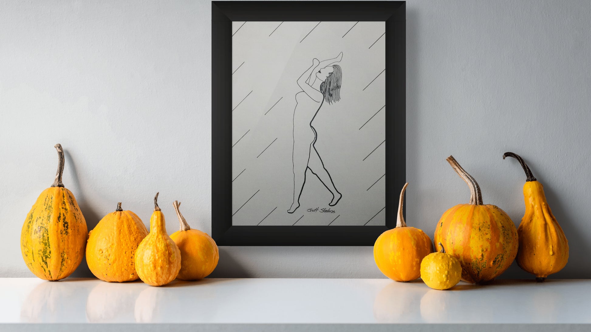 Framed original drawing of a nude dancer, suspended in tension and grace, she draws upward as if guided by unseen forces.