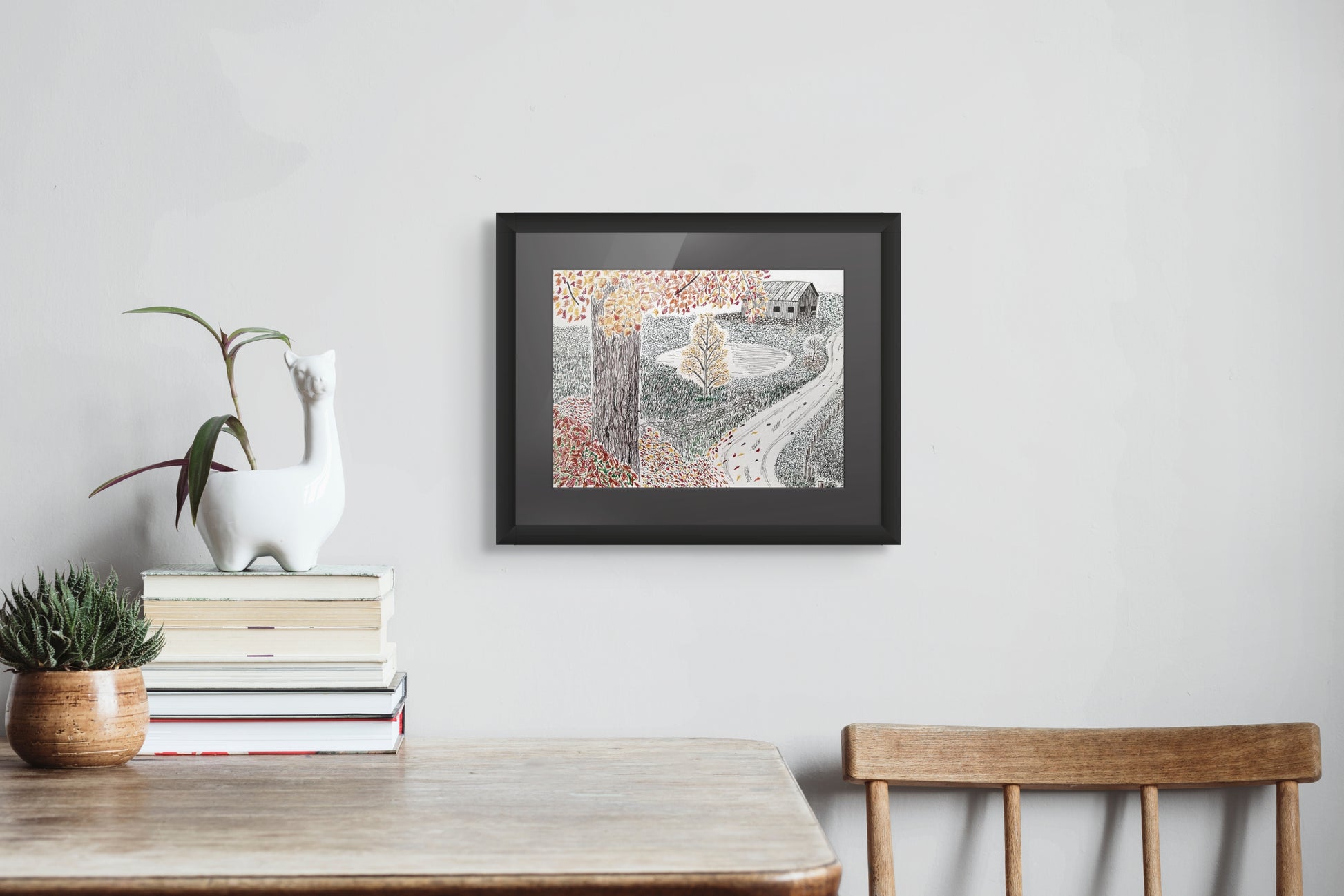Framed drawing of an autumn scene with trees and a barn.